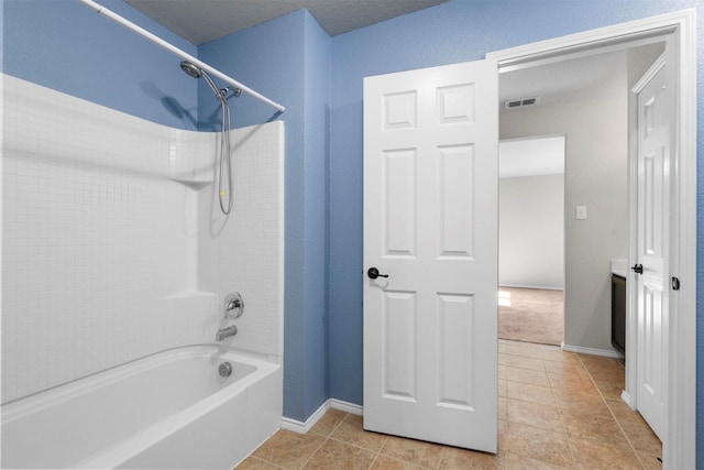 bathroom featuring tile patterned floors and shower / washtub combination