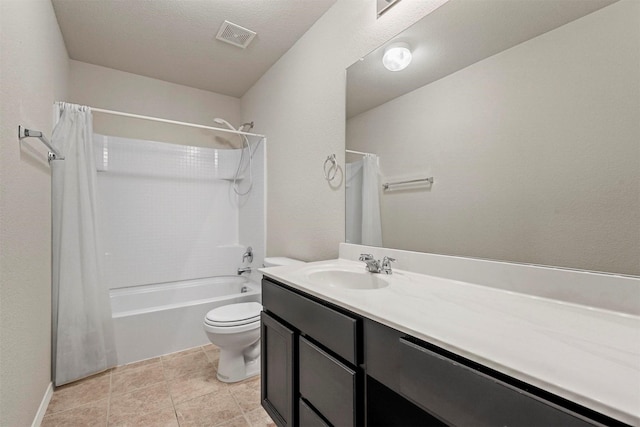 full bathroom with shower / tub combo, vanity, tile patterned flooring, and toilet