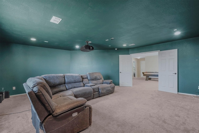 carpeted home theater with a textured ceiling, recessed lighting, billiards, visible vents, and baseboards