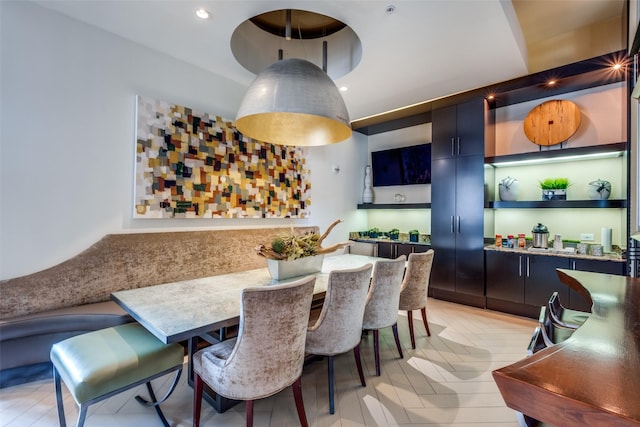 dining room featuring light parquet floors