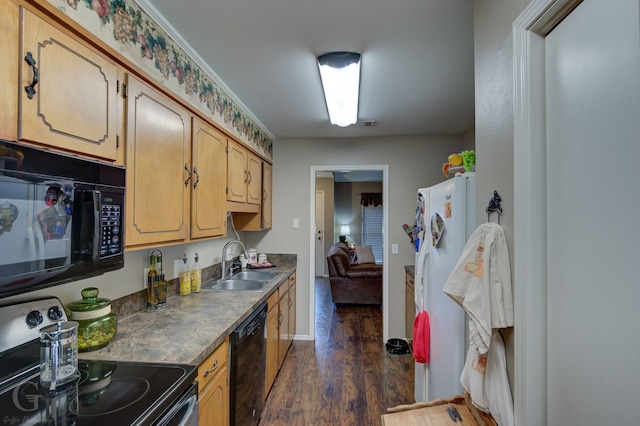 kitchen featuring black appliances, dark hardwood / wood-style flooring, and sink