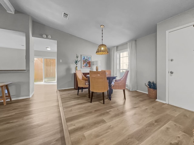 dining room with hardwood / wood-style floors