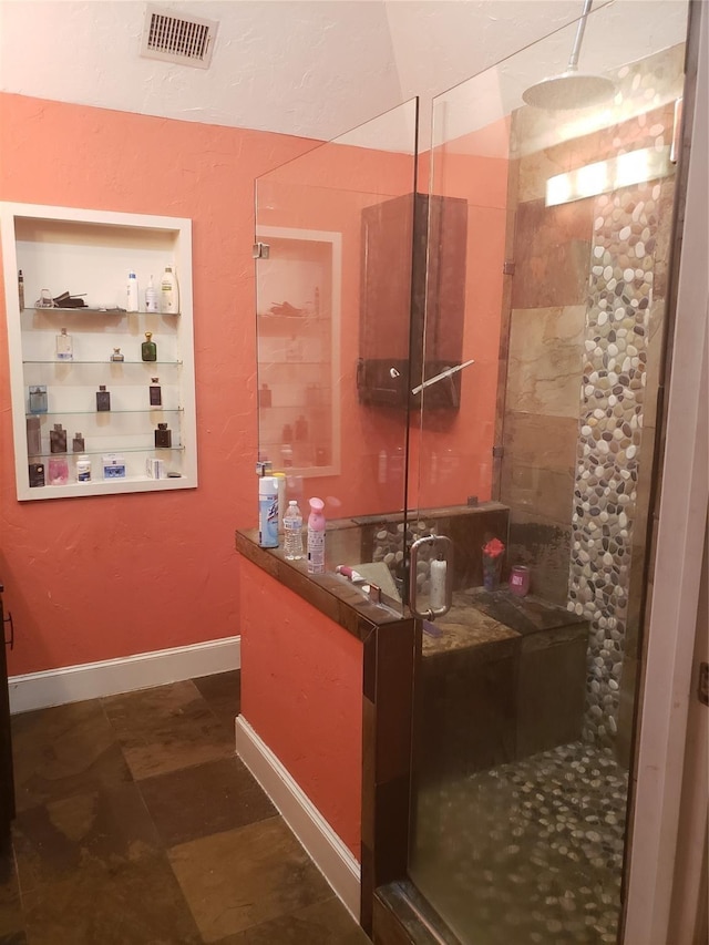 bathroom with walk in shower