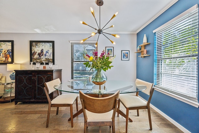 dining space featuring wood-type flooring, a chandelier, a wealth of natural light, and ornamental molding