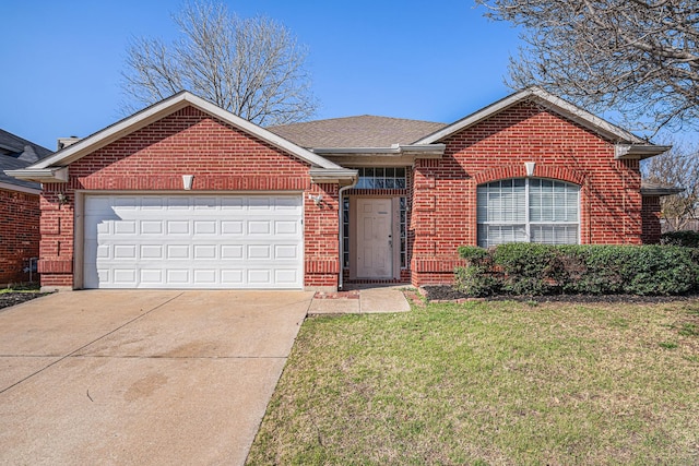 view of front of house featuring a garage and a front yard