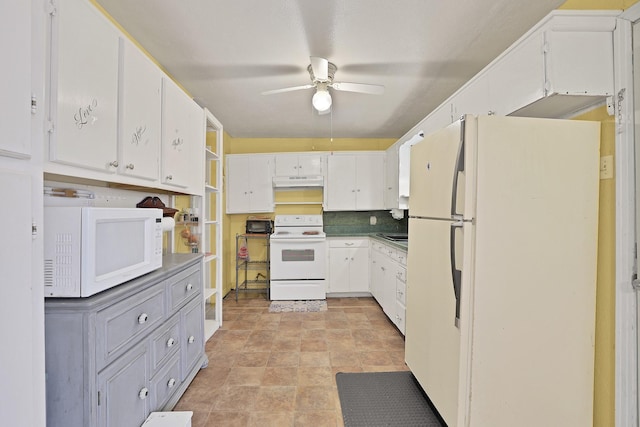 kitchen featuring ceiling fan, white appliances, and white cabinets