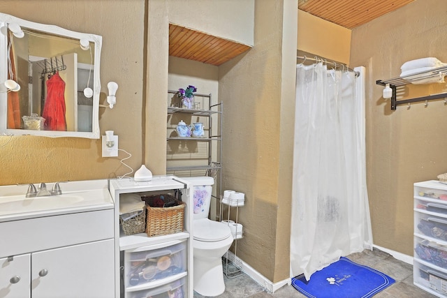 bathroom featuring toilet, wooden ceiling, vanity, and curtained shower