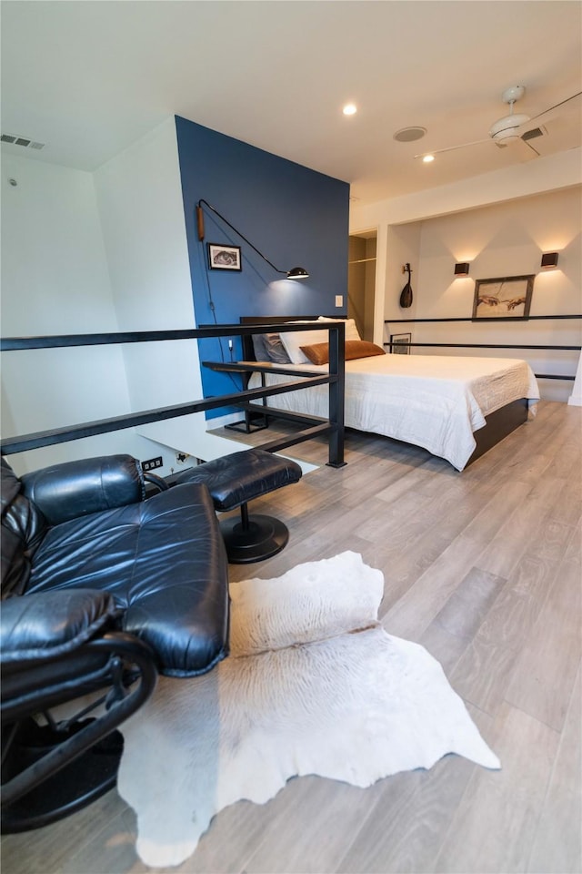 bedroom featuring hardwood / wood-style flooring