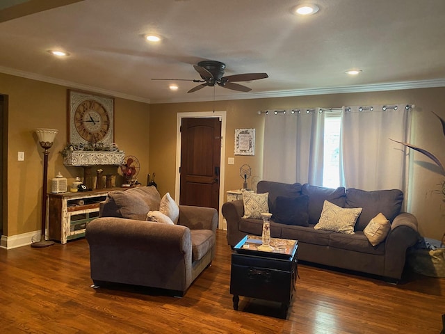 living room featuring ceiling fan, dark hardwood / wood-style floors, and ornamental molding