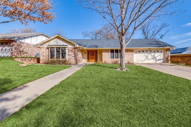 ranch-style home with a front yard and a garage