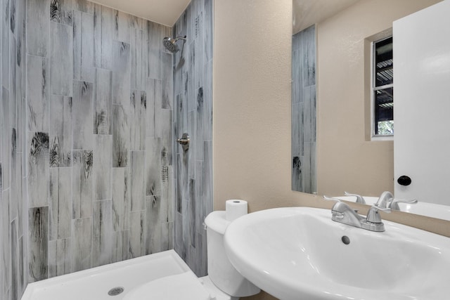 3482 Bandera Rd, Fort Worth, TX 76116 - bathroom featuring a sink, a shower stall, and toilet