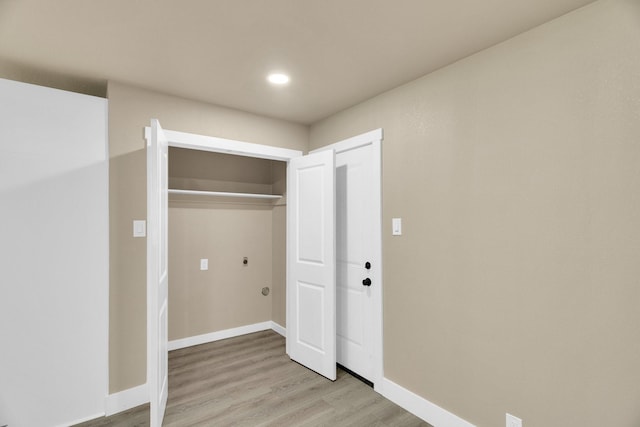 3482 Bandera Rd, Fort Worth, TX 76116 - washroom featuring light wood-style floors, baseboards, and recessed lighting