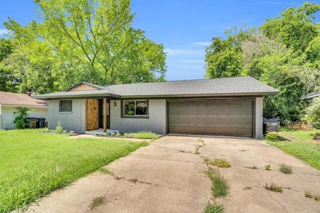 3482 Bandera Rd, Fort Worth, TX 76116 - view of front facade with concrete driveway, a garage, brick siding, and a front yard
