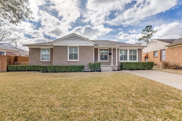 single story home with a front yard