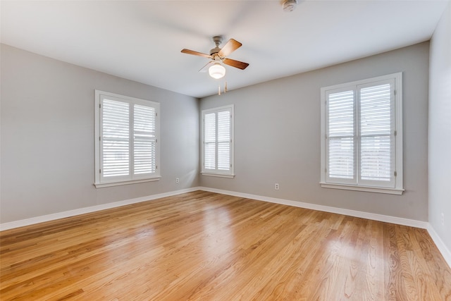 unfurnished room featuring ceiling fan and light hardwood / wood-style flooring