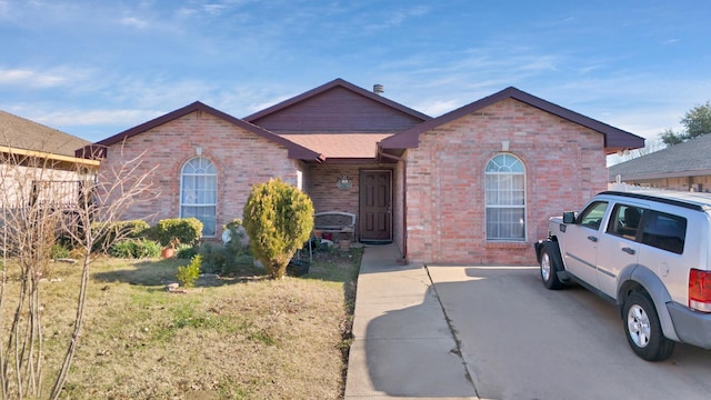 view of front of home with a front lawn