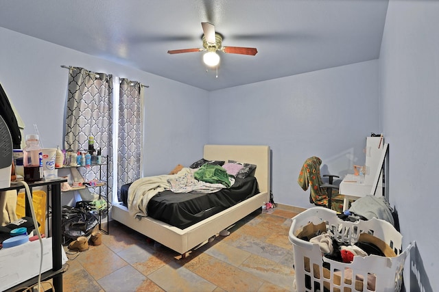 bedroom featuring ceiling fan