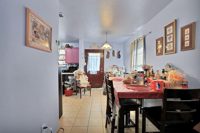 view of tiled dining room