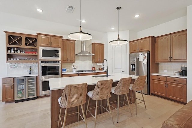 2613 Somerset Ln, Celina, TX 75009 - kitchen featuring wine cooler, appliances with stainless steel finishes, wall chimney range hood, a sink, and decorative backsplash