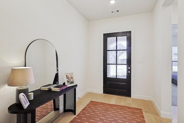 entrance foyer with light hardwood / wood-style floors