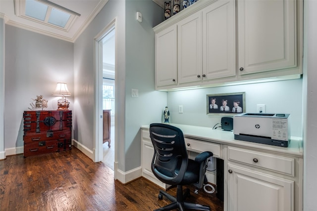 home office with dark hardwood / wood-style floors and crown molding