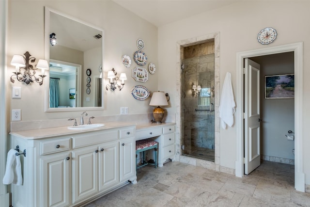 bathroom featuring walk in shower and vanity