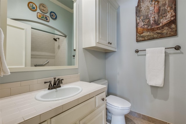 bathroom with toilet and vanity