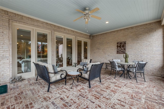 view of patio featuring ceiling fan and outdoor lounge area