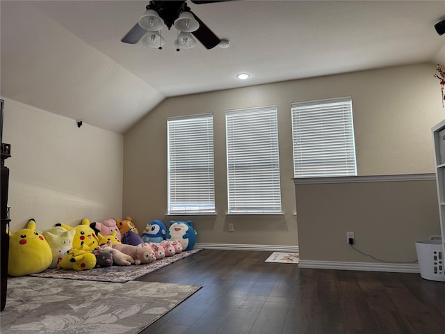 unfurnished bedroom with dark wood-type flooring, ceiling fan, and lofted ceiling