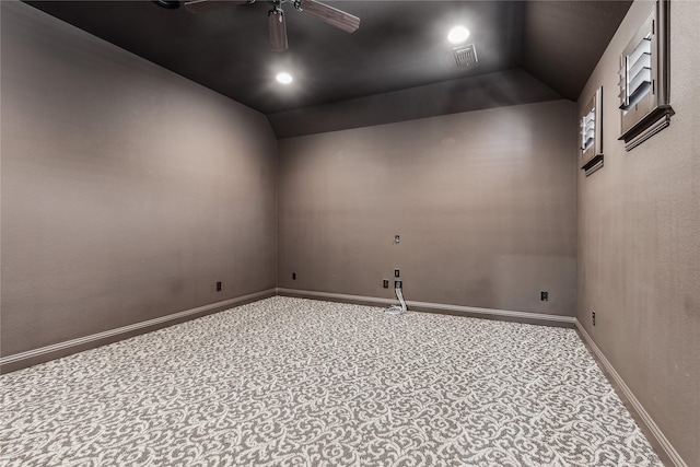 unfurnished room with lofted ceiling and ceiling fan