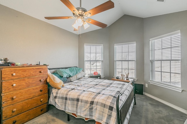 carpeted bedroom featuring ceiling fan and vaulted ceiling