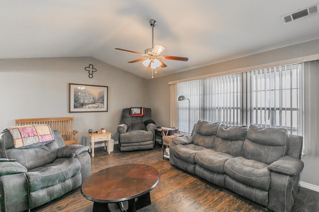 living room featuring vaulted ceiling, ceiling fan, and dark hardwood / wood-style floors