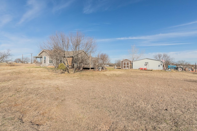 view of yard with a shed