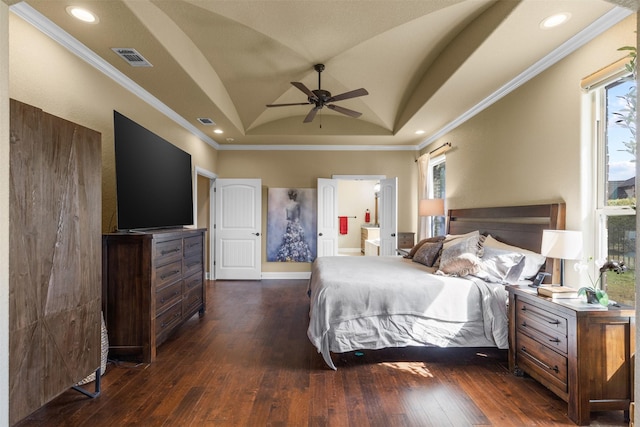 bedroom with lofted ceiling, ceiling fan, ensuite bathroom, dark hardwood / wood-style floors, and ornamental molding