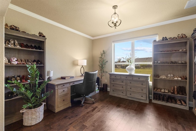 home office with dark wood-type flooring, a textured ceiling, and ornamental molding