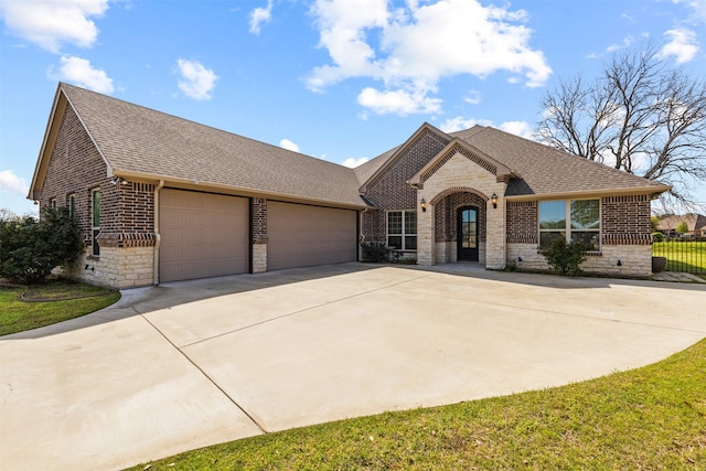 view of front of property featuring a garage