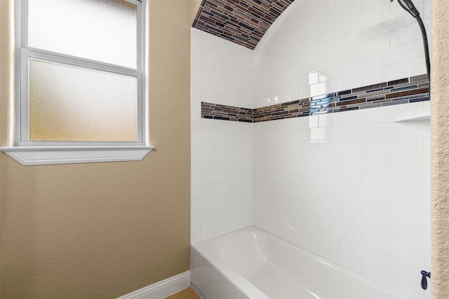 bathroom with shower / bath combination