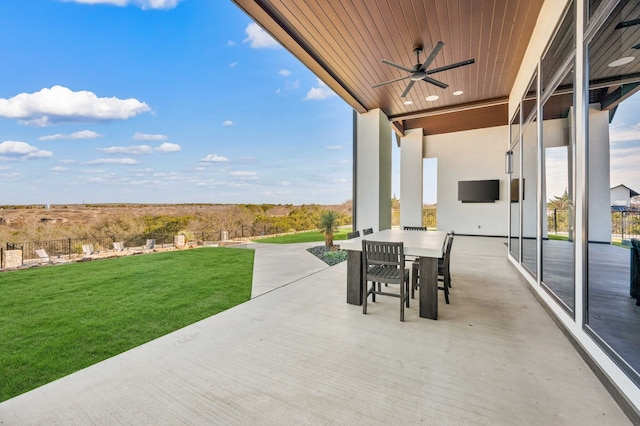 view of patio featuring ceiling fan