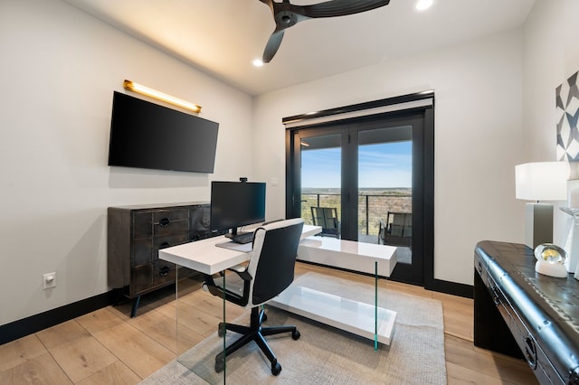 office area featuring light wood-type flooring and ceiling fan