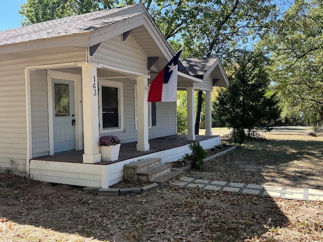 entrance to property with covered porch