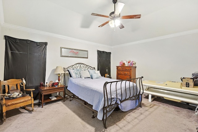 bedroom with ceiling fan, crown molding, and carpet flooring