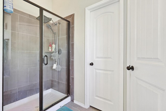 bathroom featuring an enclosed shower