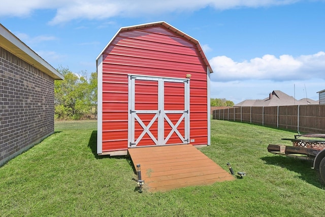 view of outdoor structure with a yard