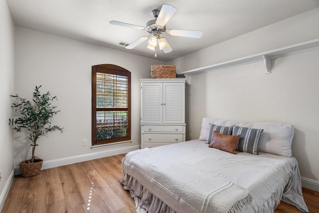 bedroom featuring ceiling fan and light hardwood / wood-style floors