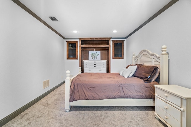 carpeted bedroom with crown molding