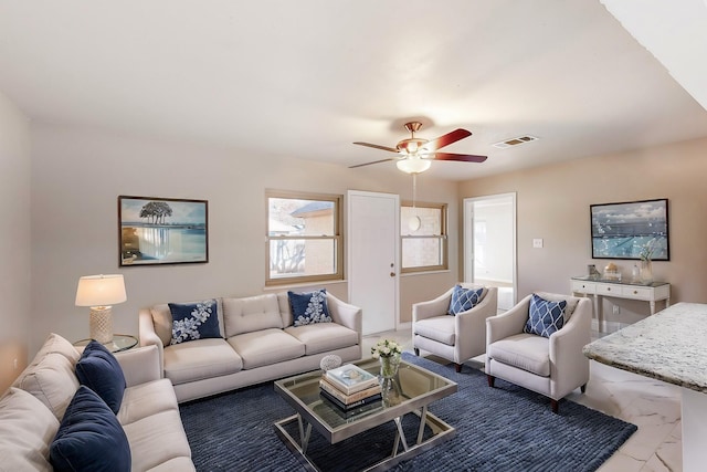 living room with ceiling fan