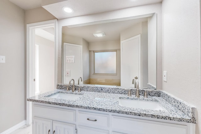 bathroom featuring vanity