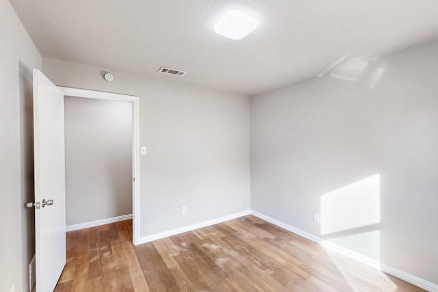 empty room featuring light hardwood / wood-style floors