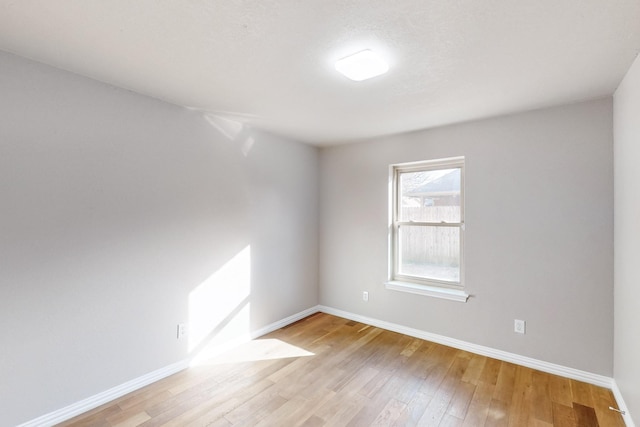 empty room featuring light hardwood / wood-style floors