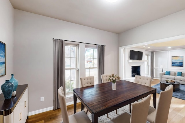 dining area with hardwood / wood-style floors